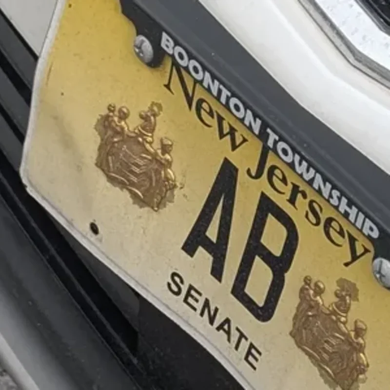 AB — Senate plate, Cadillac