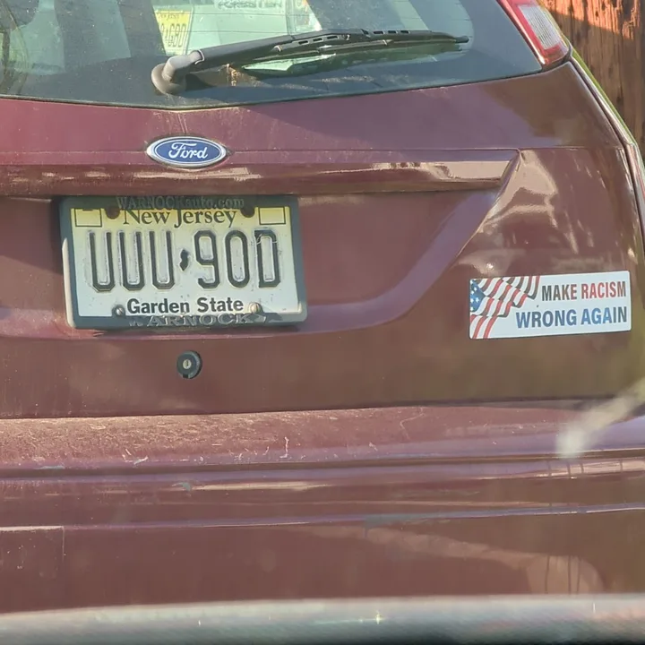 car with bumper sticker (2023-05-27)