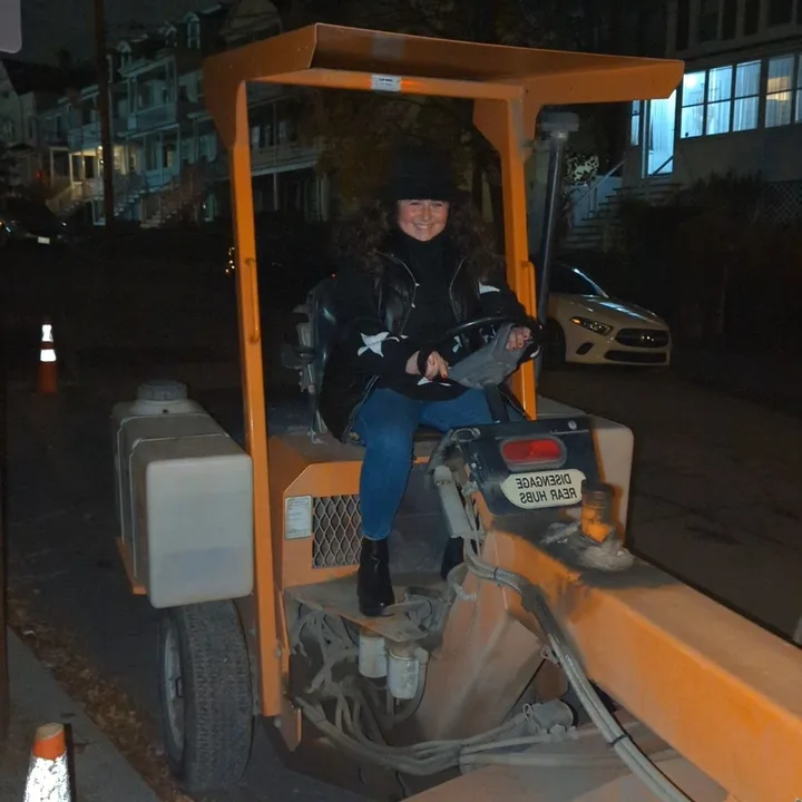 woman on a construction vehicle (2023-11-10)