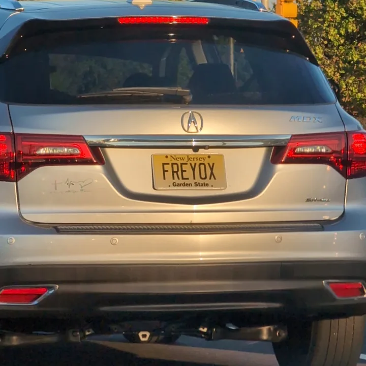 silver acura mdx with vanity plate (2025-09-28)