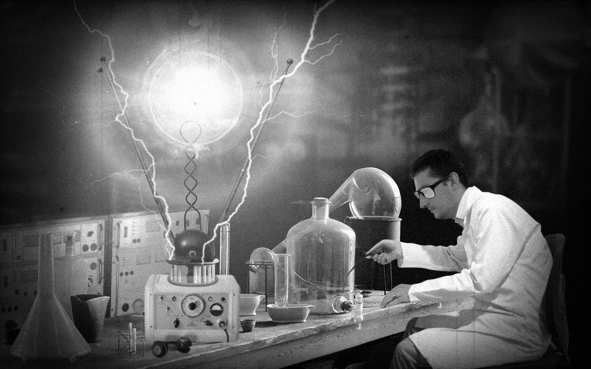 Scientist mid-experiment with an iron washer